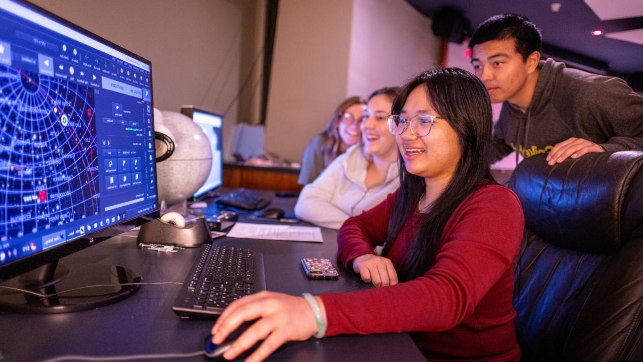 Astrophysics Minor students on computer