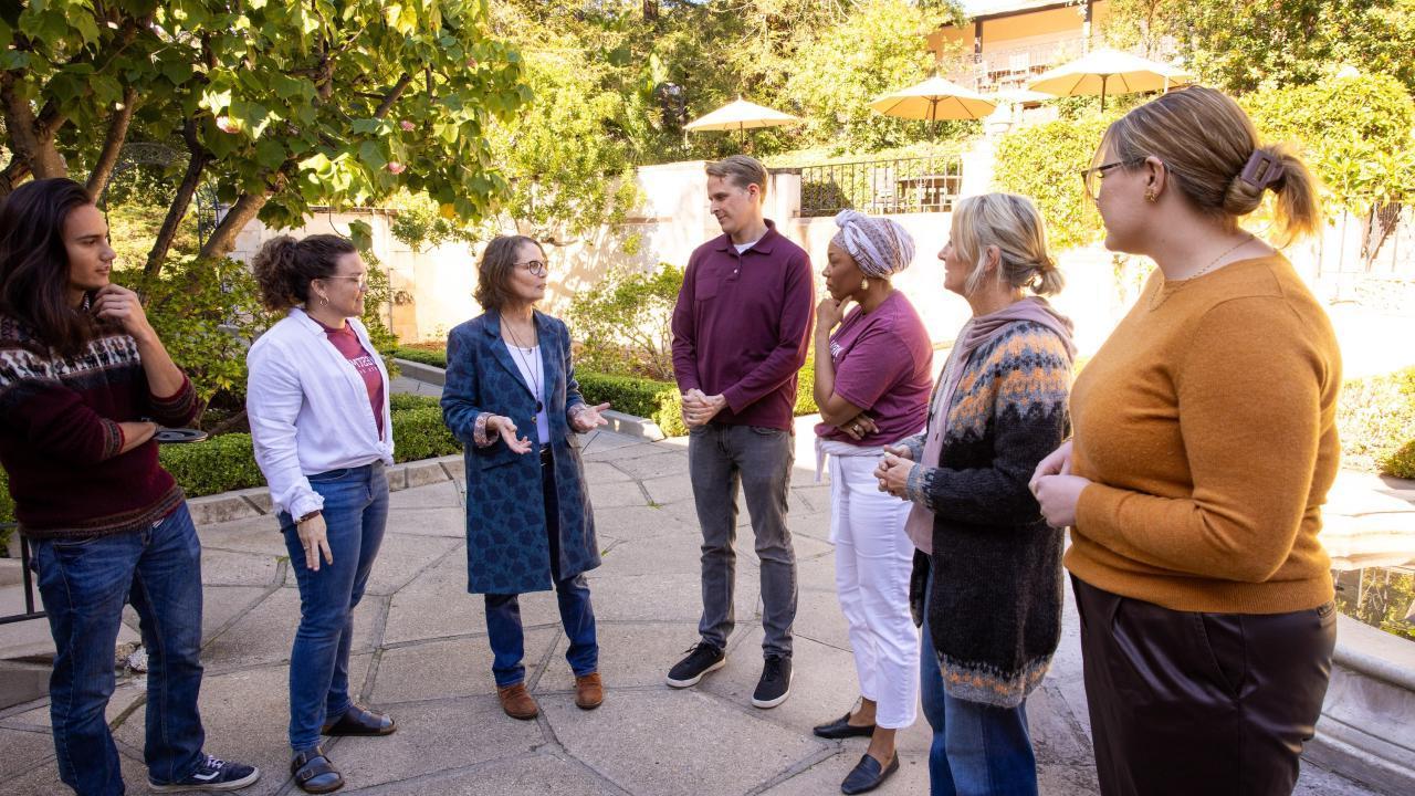 theological group chatting outside