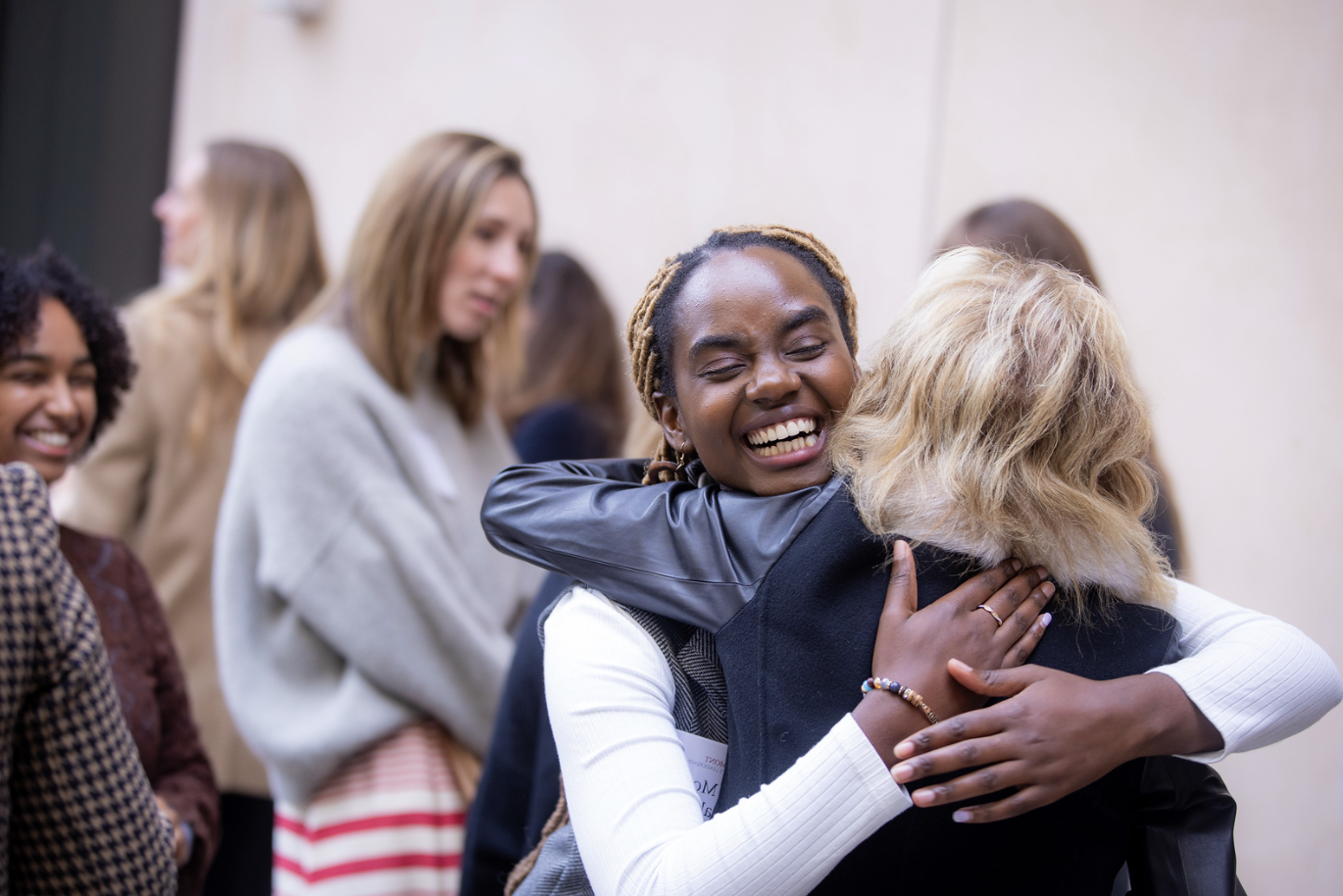 students hugging